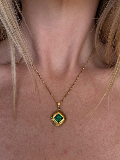 The Lost Queen Necklace - flat lay on jewellery box